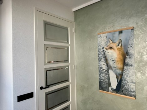 Sierpleister wand in de woonkamer